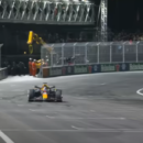 Max Verstappen en approche.